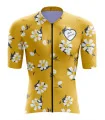 A cycle jersey with a buttercup yellow body with scattered white flowers | Cycling Jersey